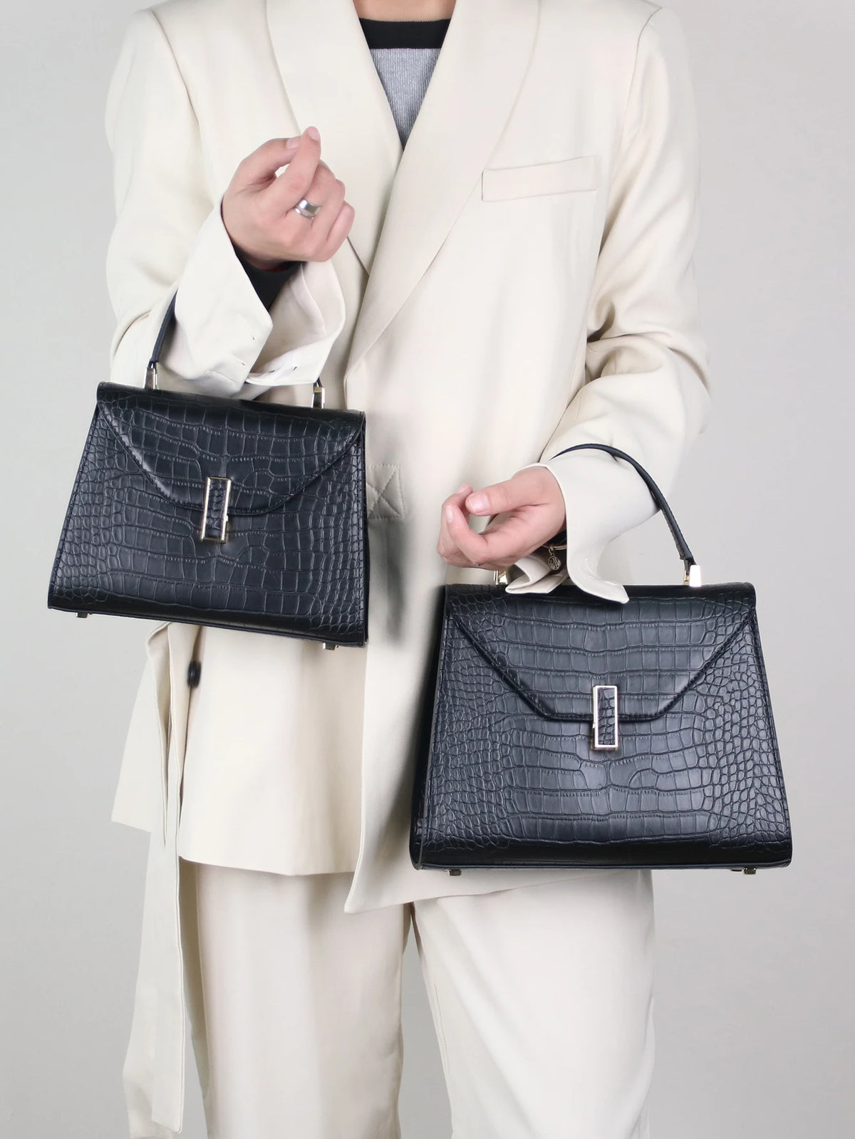 2025 new bag women's bag niche design fashion high-quality texture palm print handbag ladies commuting Joker Kelly stereotypes s