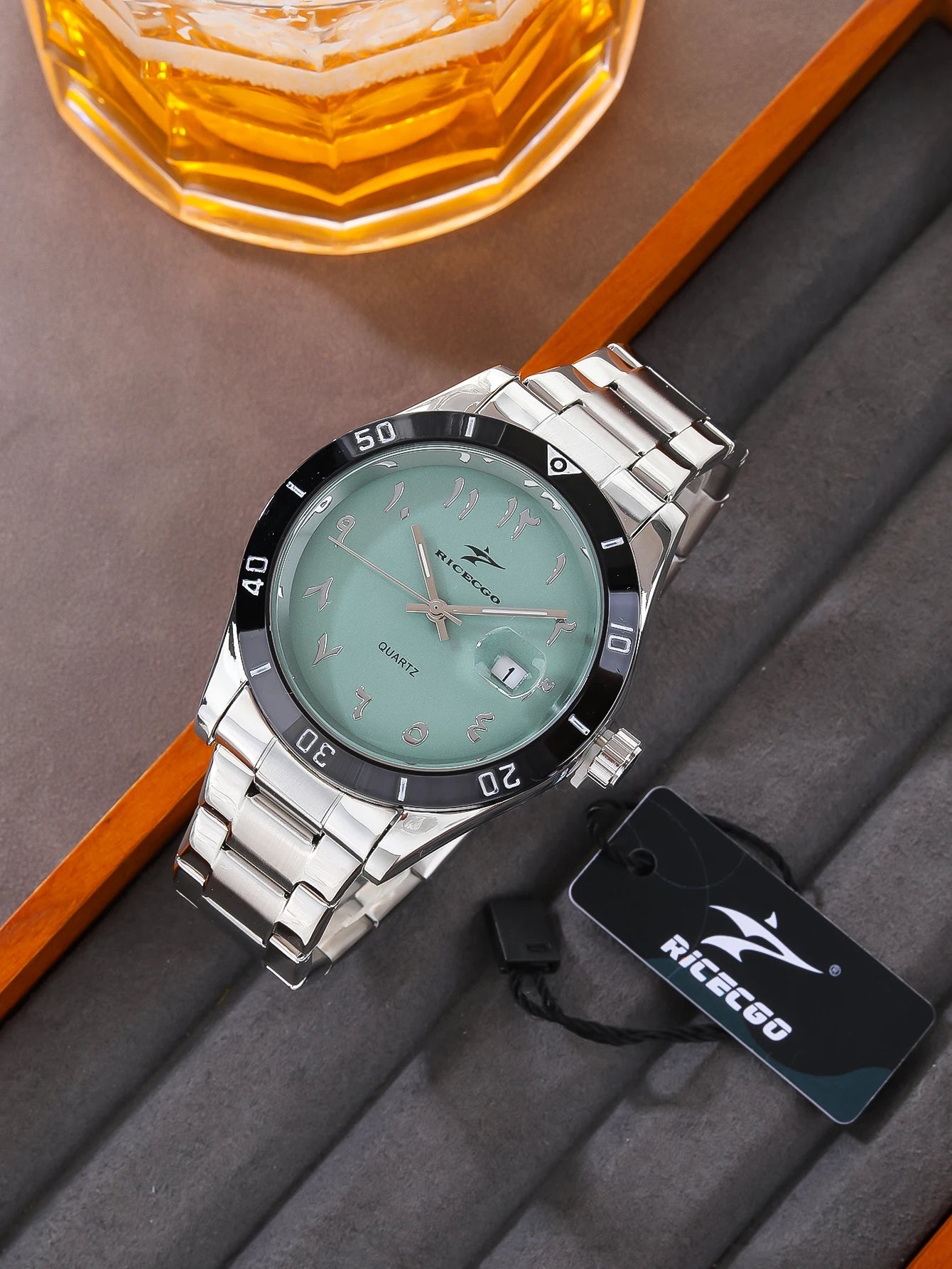 RICECGO quartz movement watch, with a high-quality metal strap, three-dimensional scale with date display, outer ring timing des