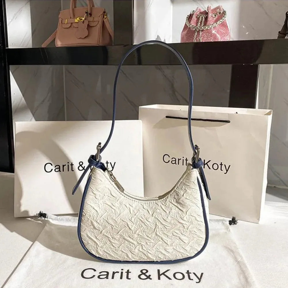 Original design advanced sense this year's popular pleated bag female summer niche design crescent bag underarm bag shoulder