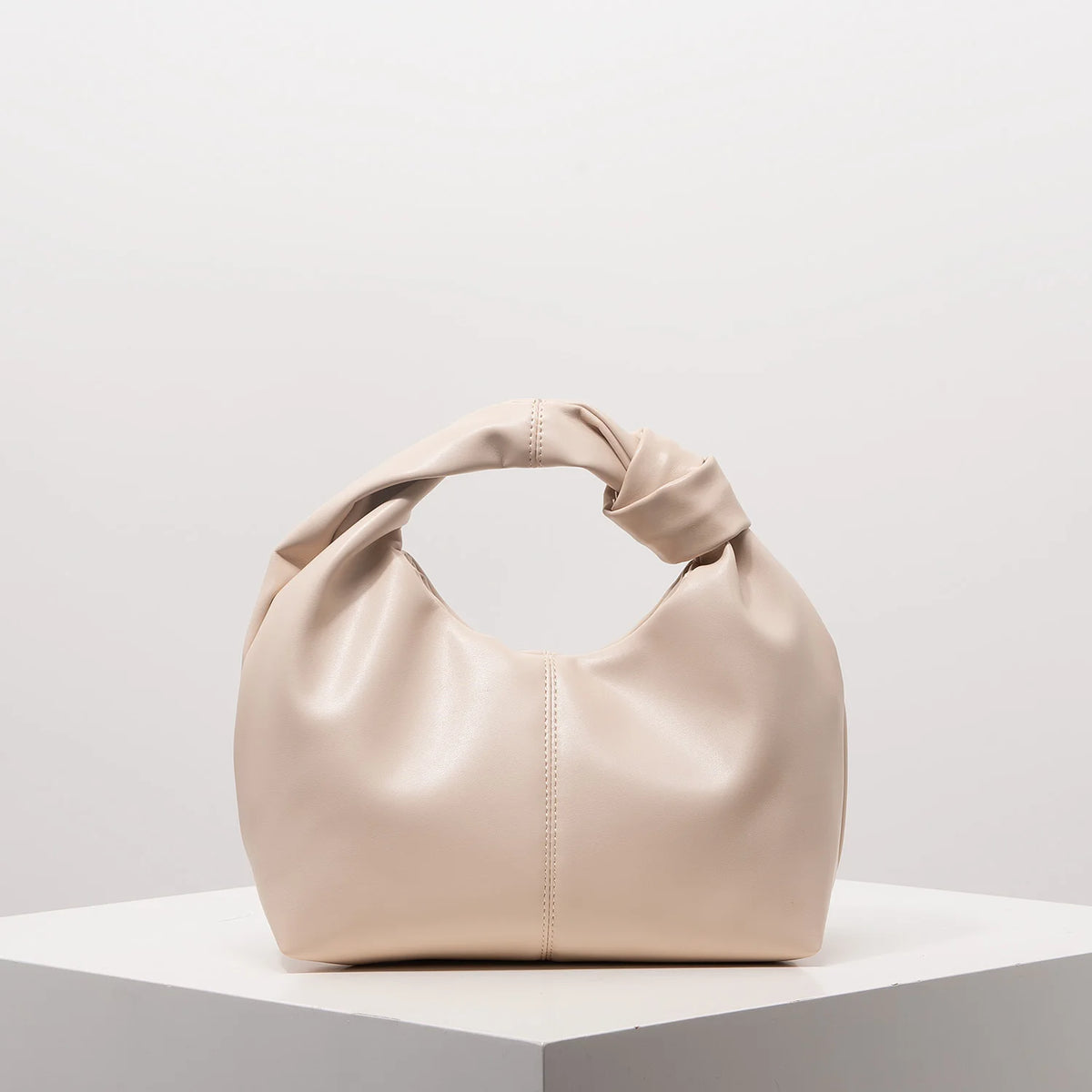 Stylish twist square bag, solid color top clutch bag, simple and versatile commut