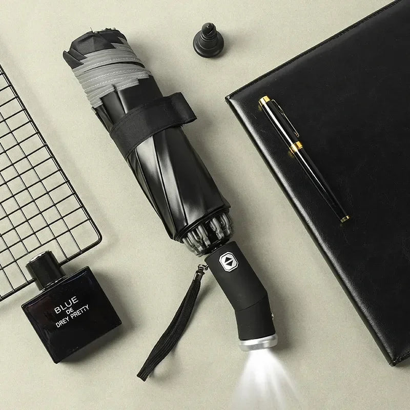 Fully automatic folding waterproof umbrella with LED flashlight and UV protection, wind and rainproof